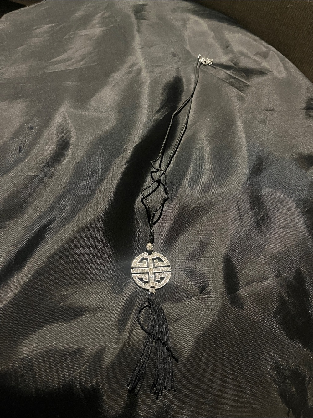 Black Tassel Necklace with Silver-tone medallion from charmelle
